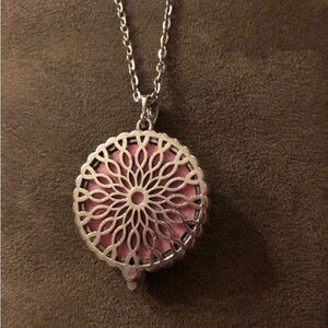 Essential Oil Diffuser Aromatherapy Daisy pattern. 24” Silver necklace.